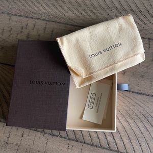 A Louis Vuitton keychain box and dust bag